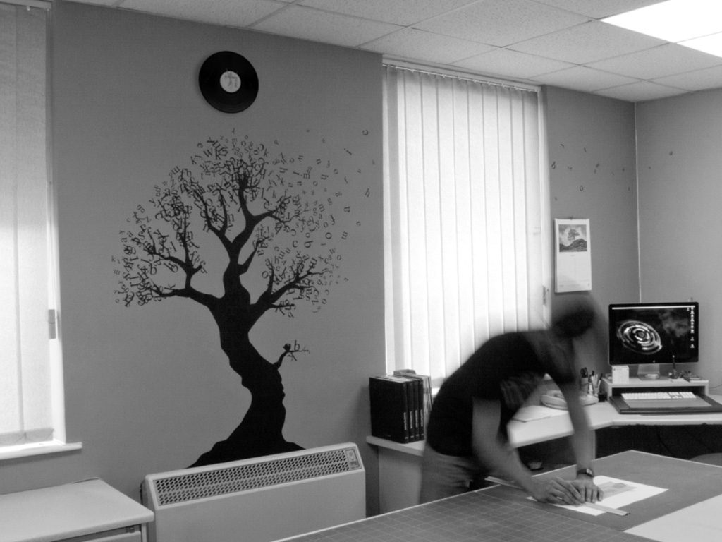 Designer working in the studio during the website planning process.